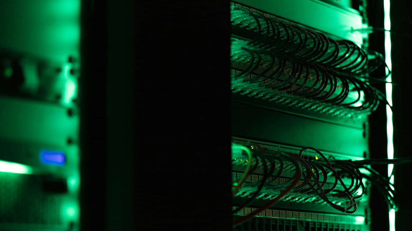 Server rack lit in green